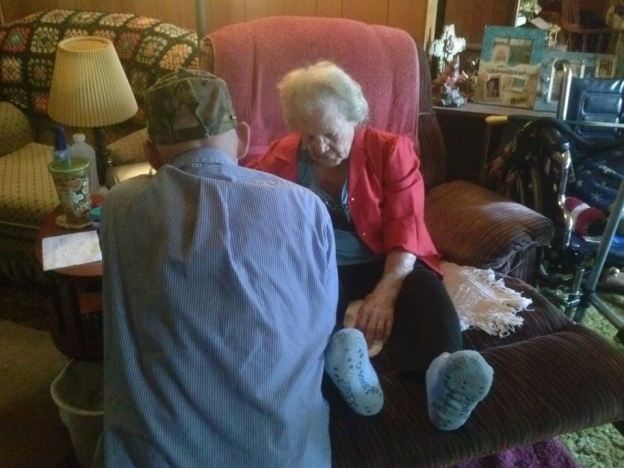 jimmy praying with Granny